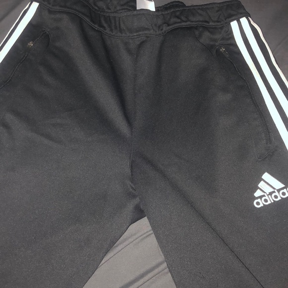 white adidas track pants